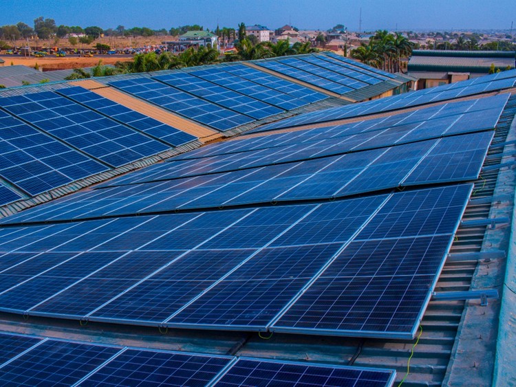 Commercial solar panel installation on building roof